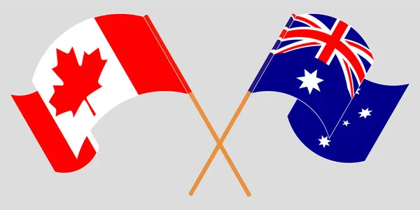 Banderas cruzadas y ondeando de Australia y Canadá — Vector de stock