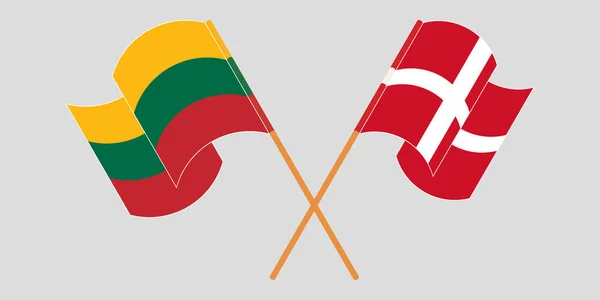 Banderas cruzadas y ondeando de Lituania y Dinamarca — Archivo Imágenes Vectoriales