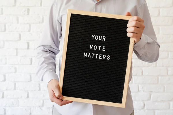 Voting Concept Man Holding Letterboard Words Your Vote Matters White — Stock Photo, Image