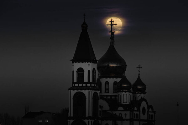 Full Super Moon over Country Church in Siberia