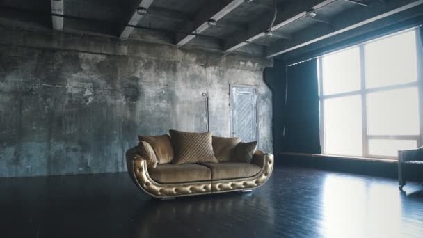 Luxury golden sofa on a loft background — Stock Video