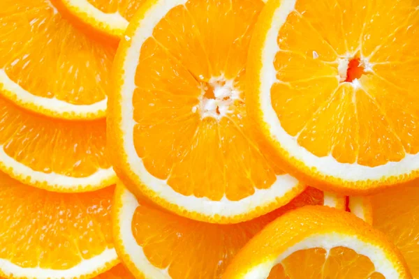 Close Van Gesneden Sinaasappelen Achtergrond — Stockfoto