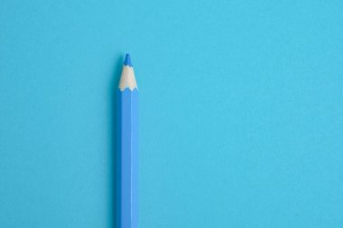 Mavi kalem mavi Kağıt arka plan üzerinde. Yakın çekim. 