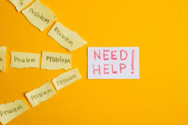Concept cry for help in solving problems. Torn stickers with the word 