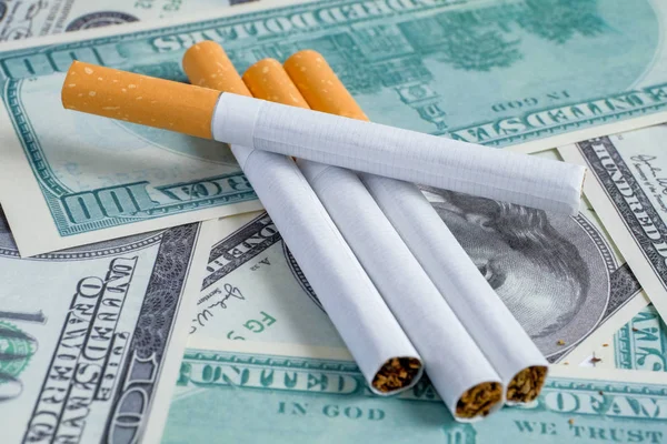 Classic cigarettes are on the hundred dollar bills of the United States.