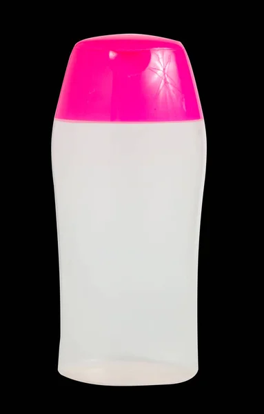 空白小隔离透明塑料瓶与粉红色帽。洗发水、化妆品包装. — 图库照片