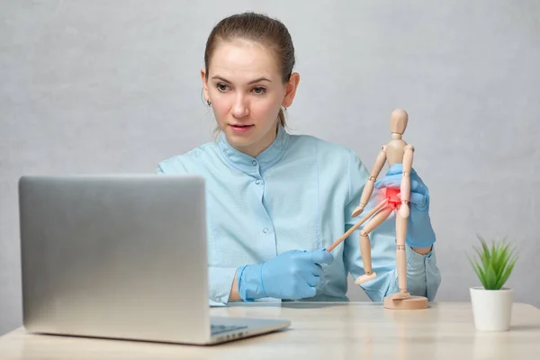 Female doctor giving an online lecture on gynecology