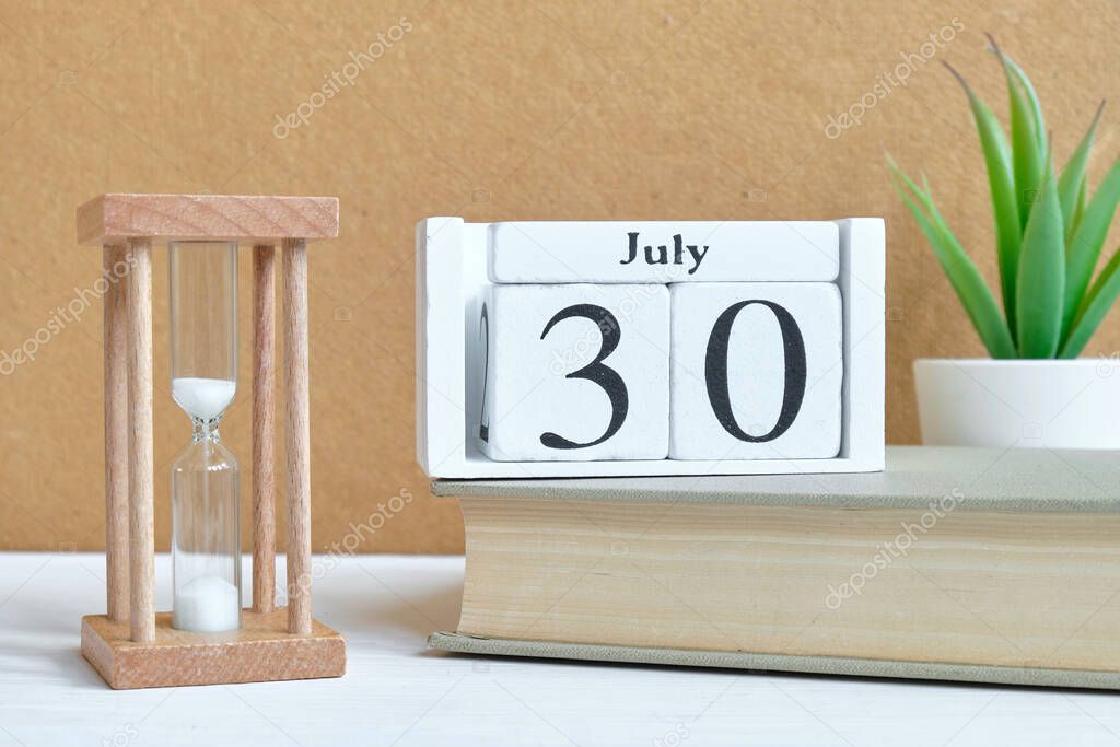 30th july - thirtieth day month calendar concept on wooden blocks