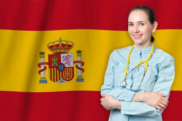 旗の背景に医師とスペインの医療概念の王国 医療保険 国内での仕事や研究 — ストック写真