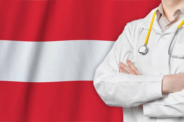 Republic of Austria healthcare concept with doctor on flag background. Medical insurance, work or study in the country