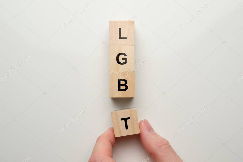 LGBT community concept on wooden cubes on a white background.