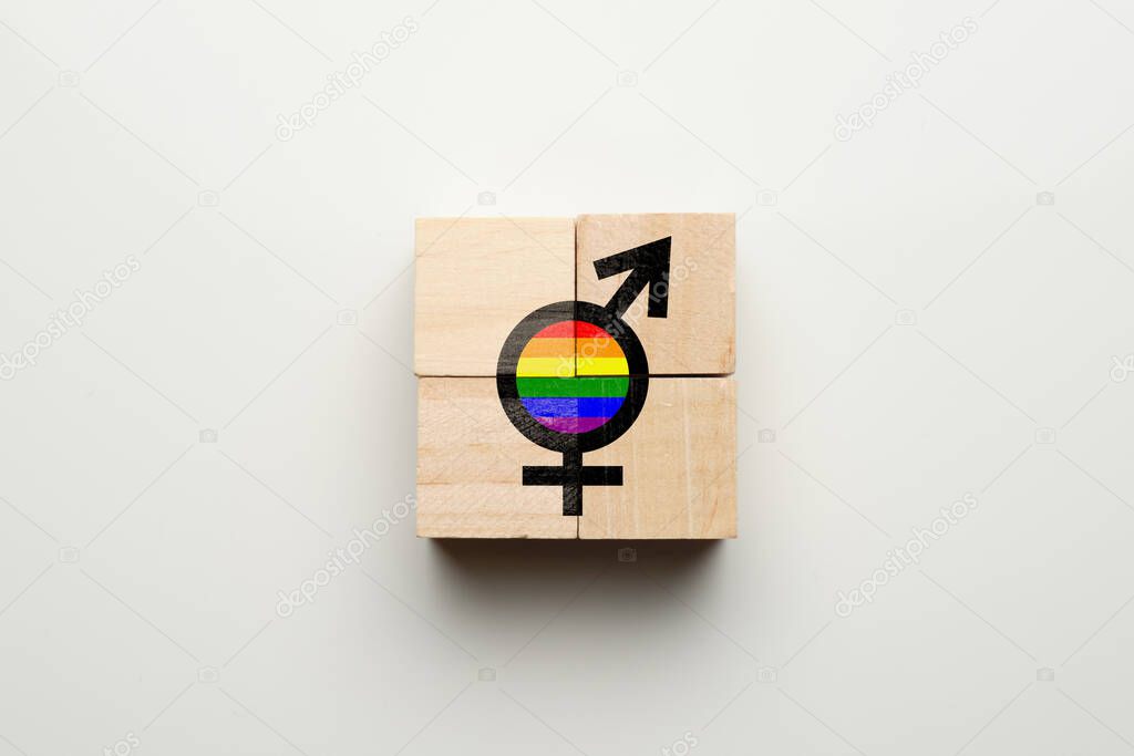 The concept of love between transgender people on wooden cubes. LGBT community