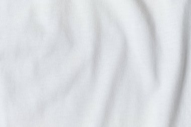 Buruşmuş beyaz kumaşın dokusu ve arkaplanı.