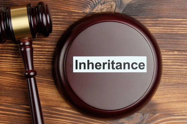 The concept of inheritance in court cases with the judge hammer.