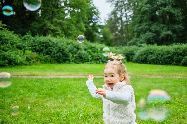 Caucasian Kid Happy Running Soap Bubbles Park Stock Image