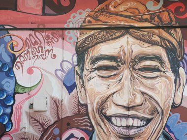 SURAKARTA, CENTRAL JAVA İNDONEZYA - Ekim 01, 2020: BAŞKAN Joko WIDODO 'NUN GRAFFITI. İNDONEZYA REPUBLİK BAŞKANI
