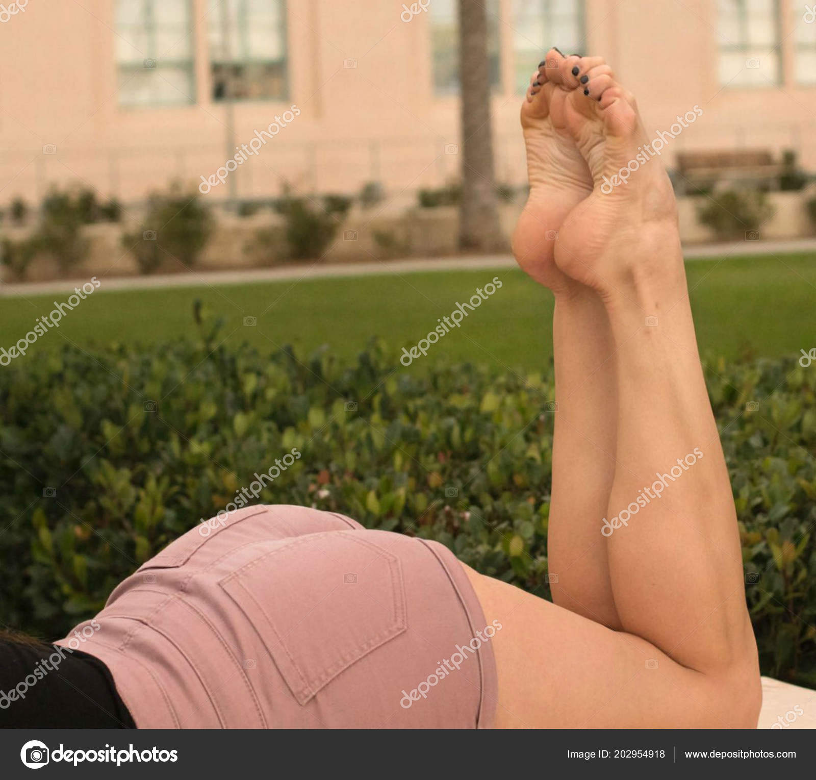 Beautiful Pointed Bare Feet — Stock Photo © ilya_rumyantsev #202954918