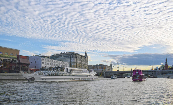 The ship sails on the river