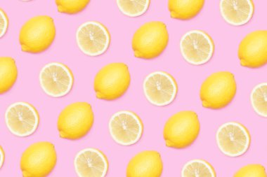 Pembe bir arka plan üzerinde sarı lemones şekli