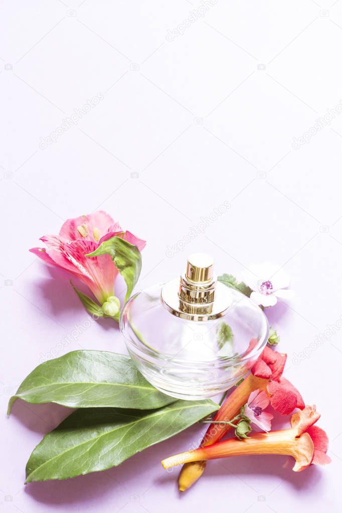 Beauty arrangment with the perfume bottle and flowers