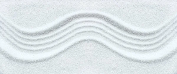 Zen pattern on white sand