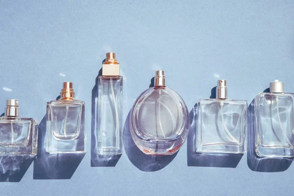 Collection Various Perfume Bottles Blue Background — Stock Photo, Image