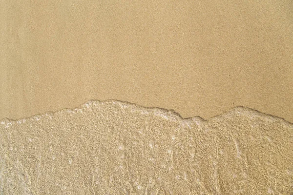 โฟมทะเลบนพ นหล งทราย — ภาพถ่ายสต็อก