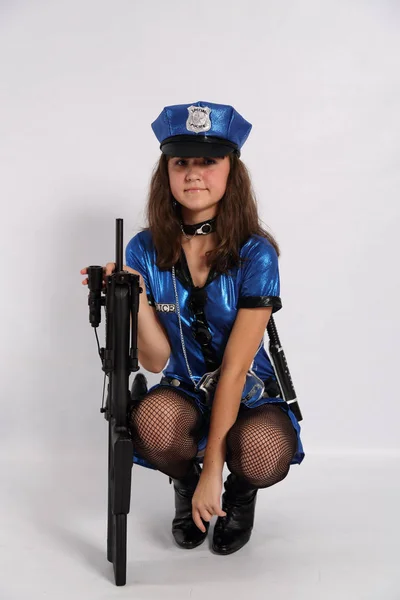 Sexy mujer policía con armas tácticas rifle —  Fotos de Stock