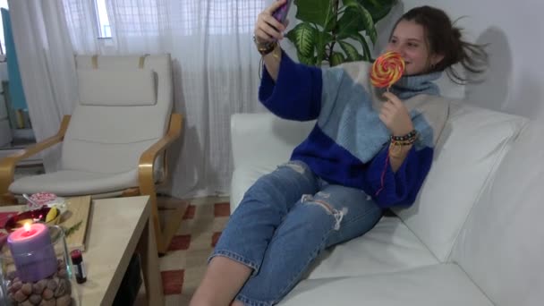 Charming Adolescent Girl Sitting Relaxed Sofa Her Free Time — Stock Video