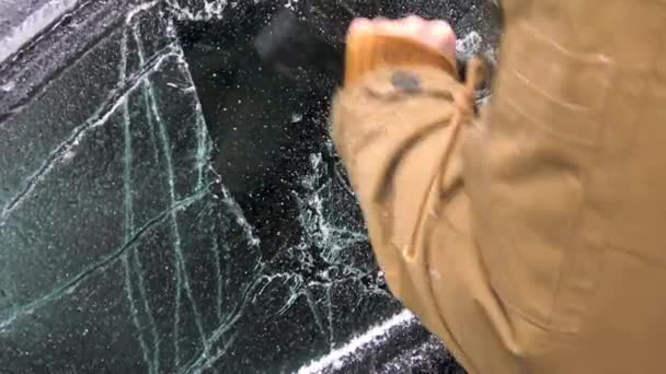 Ice Scraping Cleans Frozen Windshield Winter Time — Stock Video