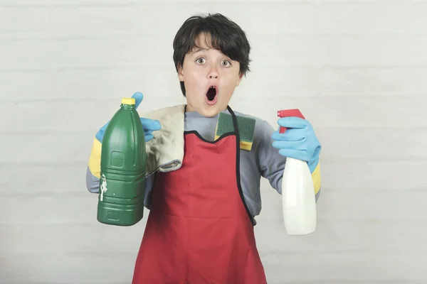 child stressed with cleaning products