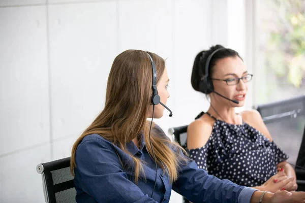 Technical support operator with headset working at laptop and computer, Business people talking on telephone with headset at office for customer help service concept