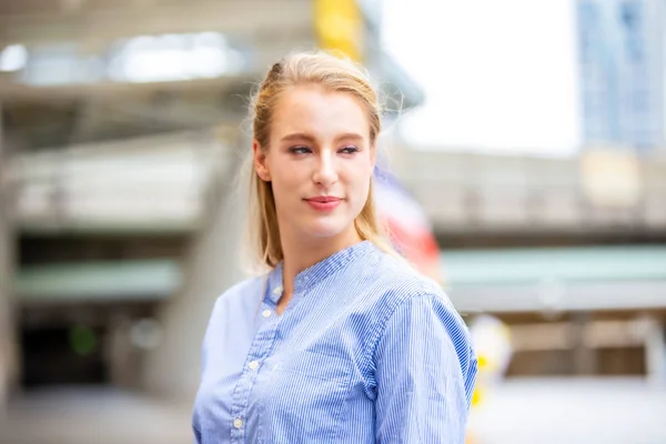 Candid portraits of female executives, or young professionals business women working at outdoor