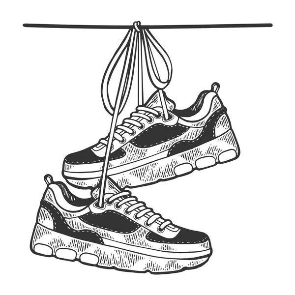 Sneakers hänger på tråd skiss gravyr vektorillustration. Repa styrelsen stil imitation. Svart och vitt handen ritade bilden. — Stock vektor