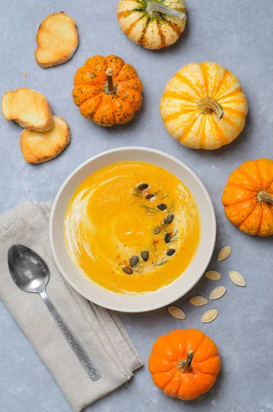 Pumpkin Soup with Cream, Dill and Pumpkin Seeds, Delicious Meal, Top View