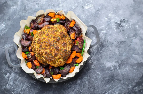 Whole Roasted Cauliflower with Vegetables, Vegan Dinner and Alternative to Roasted Chicken