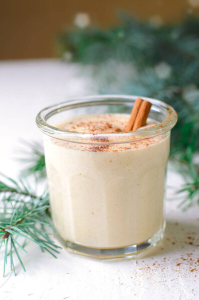 Eggnog, Traditional Christmas Drink, Homemade Cocktail with Cinnamon and Nutmeg for Winter Holidays