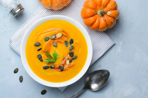 Pumpkin Soup with Pumpkin Seeds and Paprika, Delicious Vegan Meal, Vegetarian Food, Top View