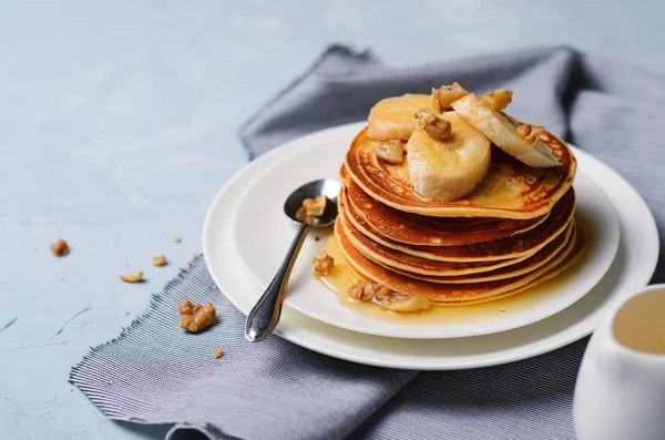 Stack of Homemade Pancakes with Banana, Nuts and Honey, Gluten Free Oat Bran Pancakes, Healthy Breakfast