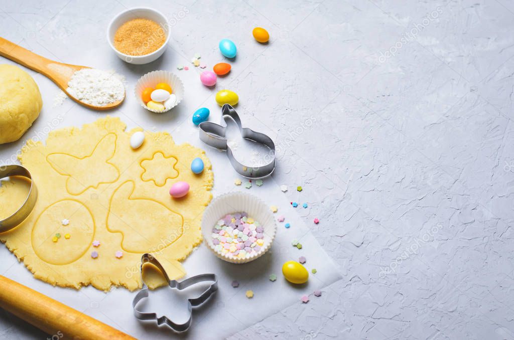 Making of Easter Cookies, Baking Background, Dough, Cookie Cutters, Sugar Sprinkles