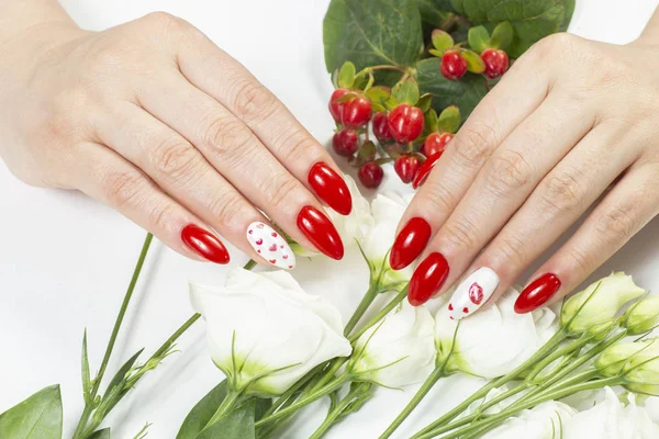 Manicure and Hands Spa. Beautiful Woman Hands with red nail Polish