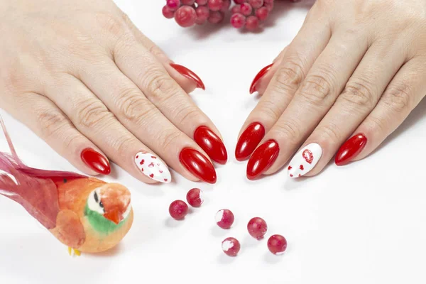 Manicure and Hands Spa. Beautiful Woman Hands with red nail Polish