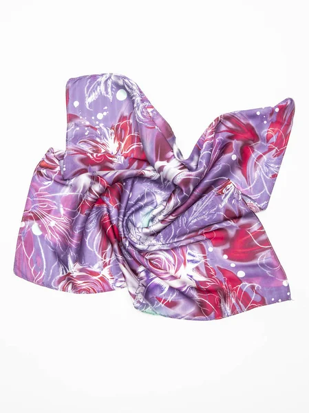 Beyaz arka plan üzerinde çok renkli İpek eşarp. Üstten Görünüm.