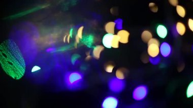 Bokeh çok renkli görüntüleri parlayan ile arka plan.