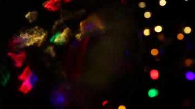 Bokeh çok renkli görüntüleri parlayan ile arka plan.