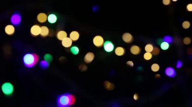 Bokeh çok renkli görüntüleri parlayan ile arka plan.