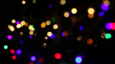 Bokeh çok renkli görüntüleri parlayan ile arka plan.