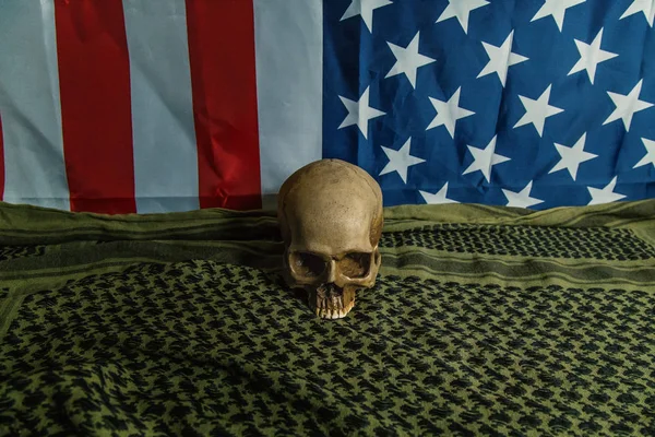 united states of America flag and Shemagh  and skull abstract background.