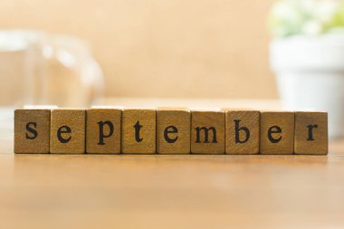 Tahta ıstampayla Eylül ay yakından görüntü arka planı için.