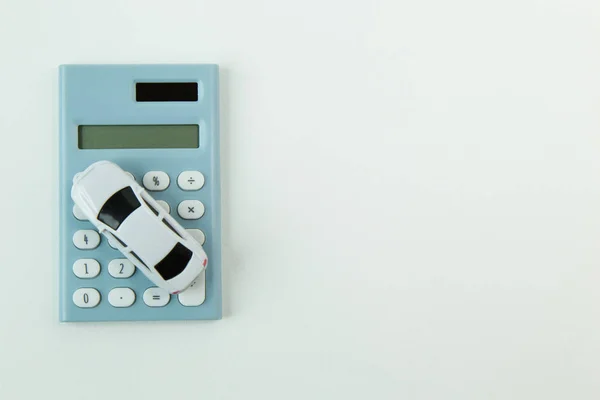 White Car Toy Blue Calculator White Background — Stock Photo, Image